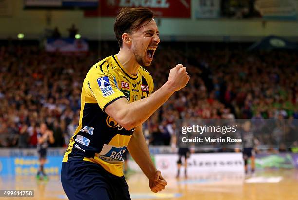 Patrick Groetzki of Rhein-Neckar Loewen celebrates during the DKB HBL Bundesliga match between SG Felnsburg-Handewitt and Rhein-Neckar Loewen at...