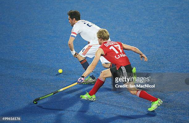 Brenden Bissett of Canada vies with Robert van der Horst captain of Netherlands during the match between Netherlands and Canada on day sic of The...