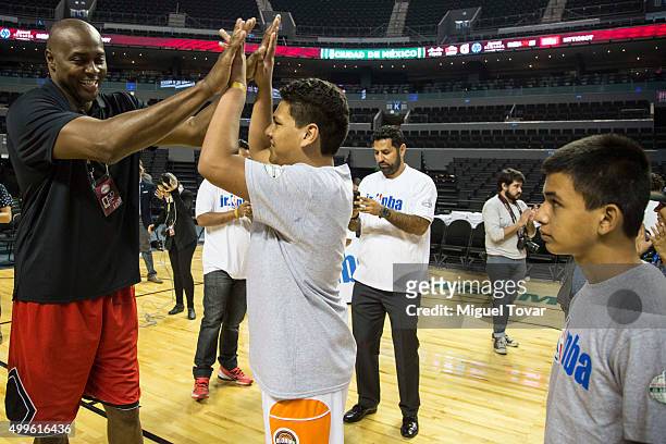 Legend Horace Grant greets with a Mexican Special Olympics athlete during the NBA Cares clinic at Arena Ciudad de Mexico on December 02, 2015 in...