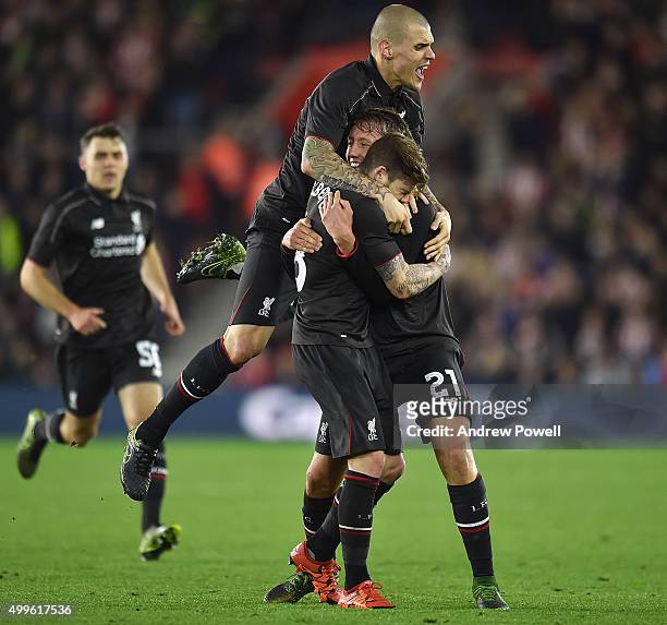 Alberto Moreno of Liverpool celebrates after scroing the third goal during the Capital One Cup Quarter Final match between Southampton and Liverpool...