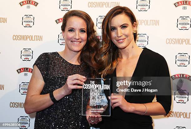 Casey Stoney and Charlie Webster poses for a photo with the award for Ultimate Sports Personality during the Cosmopolitan Ultimate Women Of The Year...