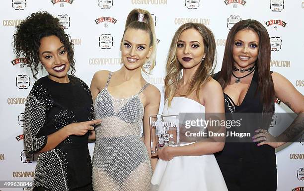 Leigh-Anne Pinnock, Perrie Edwards, Jade Thirlwal and Jesy Nelson of little Mix pose for a photo with the award for Girl Group during the...