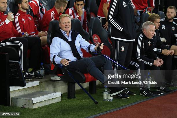Ronald Koeman, Manager of Southampton settles into his seat on crutches during the UEFA Europa League Play Off Round 1st Leg match between...