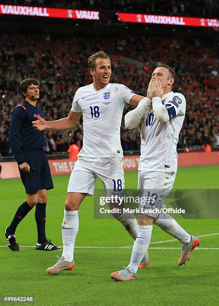 Wayne Rooney of England celebrates breaking the all time England goal scoring record with Harry Kane during the UEFA EURO 2016 Group E qualifying...