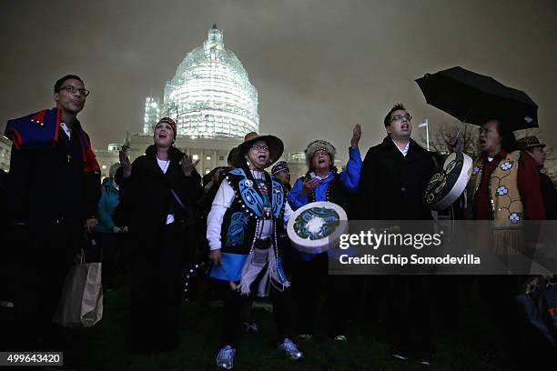 Andrea Ebona , play drums and sing in honor of the Capitol Christmas tree on the West Front of the U.S. Capitol December 2, 2015 in Washington, DC....