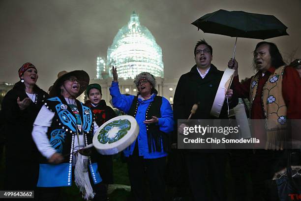 Andrea Ebona , play drums and sing in honor of the Capitol Christmas tree on the West Front of the U.S. Capitol December 2, 2015 in Washington, DC....