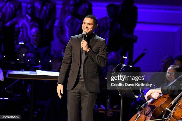 Comedian Trevor Noah speaks on stage during the ONE Campaign and s concert to mark World AIDS Day, celebrate the incredible progress thats been...