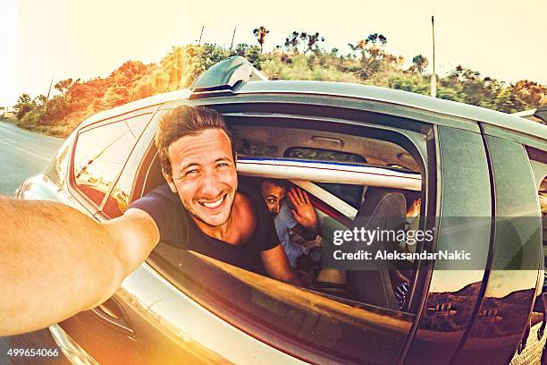 road trip selfie - male friendship stock pictures, royalty-free photos & images