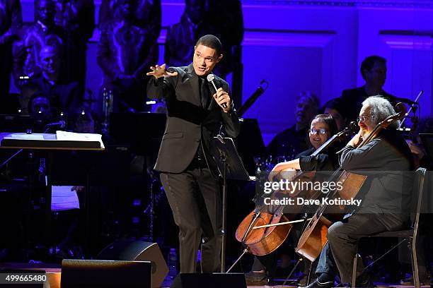 Comedian Trevor Noah speaks on stage during the ONE Campaign and s concert to mark World AIDS Day, celebrate the incredible progress thats been...