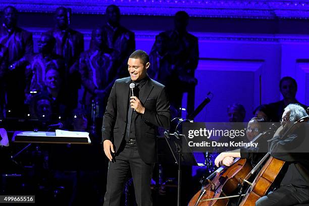 Comedian Trevor Noah speaks on stage during the ONE Campaign and s concert to mark World AIDS Day, celebrate the incredible progress thats been...