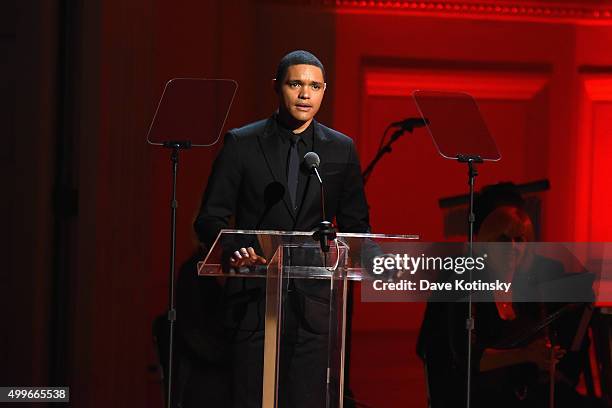 Comedian Trevor Noah speaks on stage during the ONE Campaign and s concert to mark World AIDS Day, celebrate the incredible progress thats been...