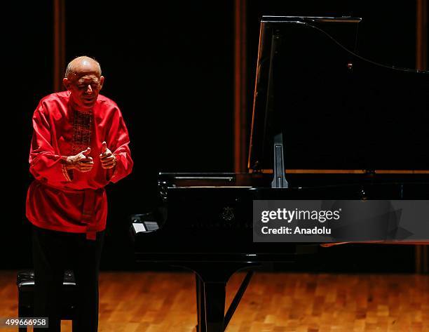 Renowned pianist David Helfgott performs during a concert at Adnan Saygun Art Center in Turkey's western city Izmir on December 02, 2015.