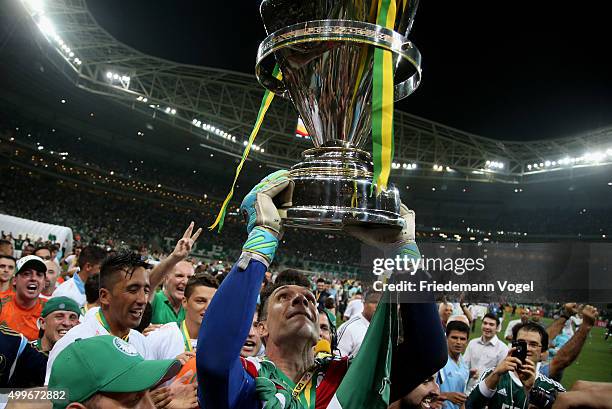 Fernando Prass of Palmeiras celebrates with the trophy after winning the match between Palmeiras and Santos for the Copa do Brasil 2015 Final at...