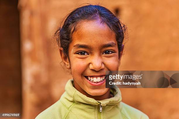 beautiful muslim girl in moroccan kasbah - moroccan culture stock pictures, royalty-free photos & images