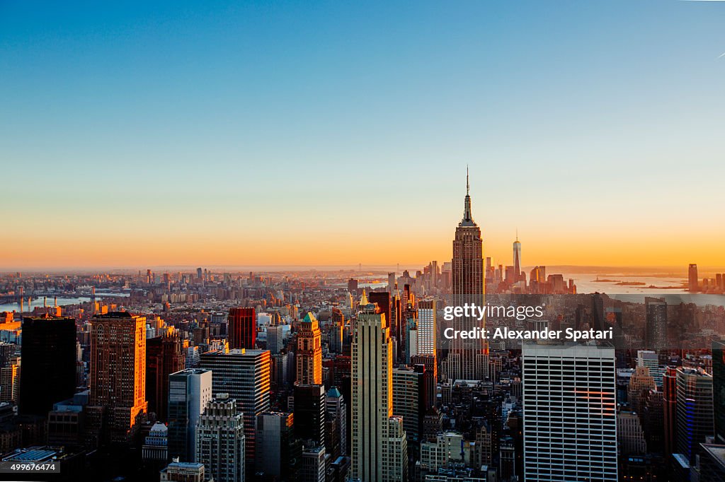 Aerial view of Manhattan skyline at sunset, New York City, USA