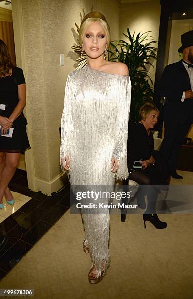 Singer Lady Gaga poses backstage during the "Sinatra 100: An All-Star GRAMMY Concert" celebrating the late Frank Sinatra's 100th birthday at the...