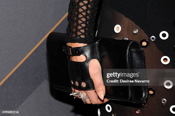 Singer Fergie, clutch and accessory detail, attends the 29th FN Achievement Awards at IAC Headquarters on December 2, 2015 in New York City.