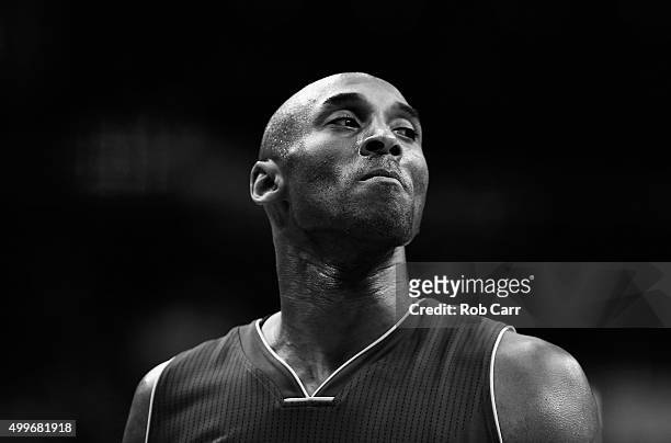 Kobe Bryant of the Los Angeles Lakers looks on against the Washington Wizards in the first half at Verizon Center on December 2, 2015 in Washington,...