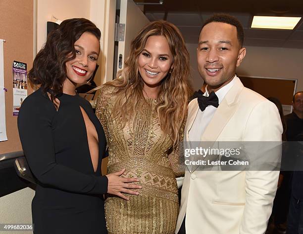 Singer Alicia Keys, model Chrissy Teigen and singer John Legend pose backstage during "Sinatra 100: An All-Star GRAMMY Concert" celebrating the late...