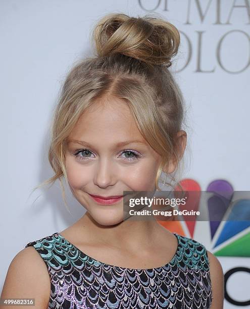 Actress Alyvia Alyn Lind arrives at the premiere of Warner Bros. Television's "Dolly Parton's Coat Of Many Colors" at the Egyptian Theatre on...