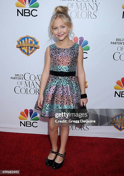 Actress Alyvia Alyn Lind arrives at the premiere of Warner Bros. Television's "Dolly Parton's Coat Of Many Colors" at the Egyptian Theatre on...
