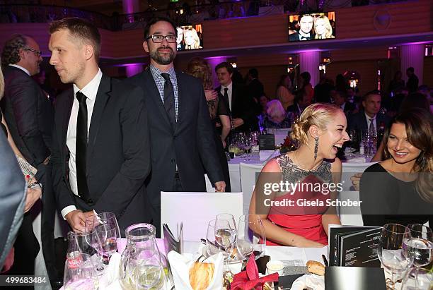 Oliver Pocher, Sabine Lisicki, Anna Lewandowski chat during the Audi Generation Award 2015 at Hotel Bayerischer Hof on December 2, 2015 in Munich,...