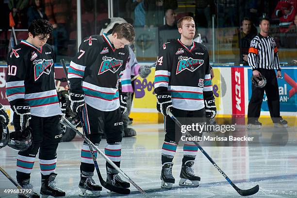 Nick Merkley, Lucas Johansen and Rourke Chartier of Kelowna Rockets line up against the Kootenay Ice on December 2, 2015 at Prospera Place in...