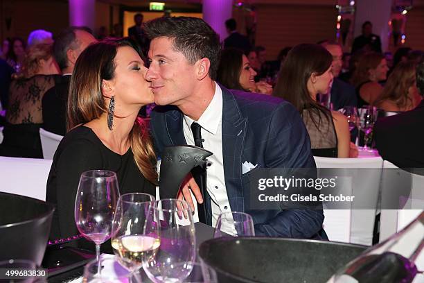 Anna Lewandowski and Robert Lewandowski with award during the Audi Generation Award 2015 at Hotel Bayerischer Hof on December 2, 2015 in Munich,...