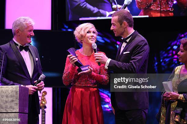 Alexander Schuhmacher, Audi, Wolke Hegenbarth with award, Kai Pflaume during the Audi Generation Award 2015 at Hotel Bayerischer Hof on December 2,...