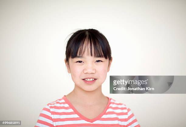 ten year old girl in the studio - asian girl smile stock pictures, royalty-free photos & images