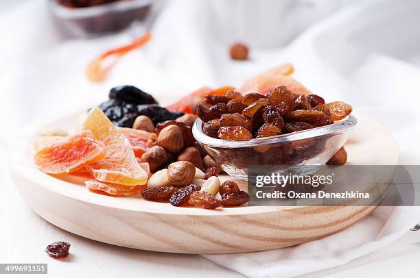 sweet dried fruits and nuts - dried plum stock pictures, royalty-free photos & images