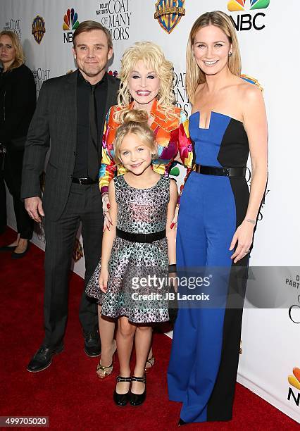 Ricky Schroder, Dolly Parton,Alyvia Alyn Lind and Jennifer Nettles attend the premiere of Warner Bros. Television's "Dolly Parton's Coat Of Many...