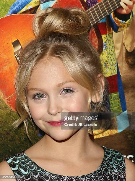 Alyvia Alyn Lind attends the premiere of Warner Bros. Television's "Dolly Parton's Coat Of Many Colors" on December 2, 2015 in Hollywood, California.