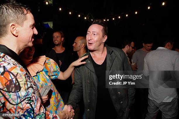 Julian Lennon greets Jeremy Scott at the Jeremy Scott Art Basel Party at The Hall on December 2, 2015 in Miami Beach, Florida.