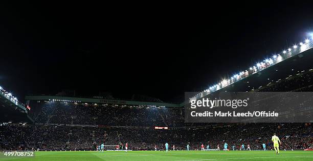 General view as fans shine the torch lights on their mobile phones in memory of George Best, on the tenth anniversary of his death, during the UEFA...