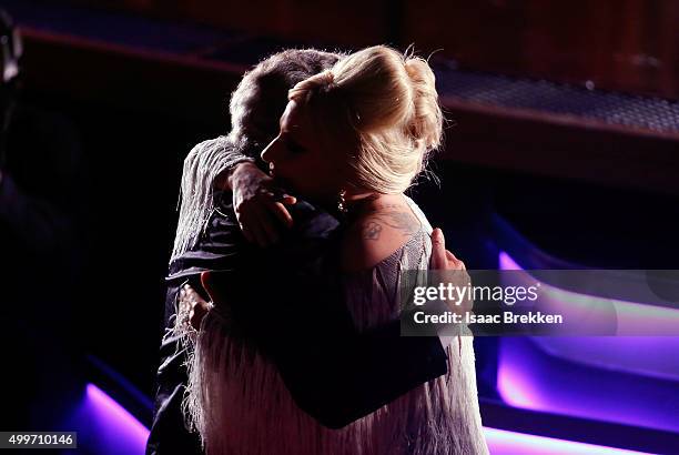 Lady Gaga hugs Tony Bennett before during "Sinatra 100: An All-Star GRAMMY Concert" celebrating the late Frank Sinatra's 100th birthday at the Encore...