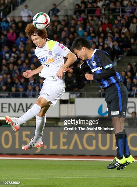 Sho Sasaki of Sanfrecce Hiroshima scores his team's second goal during the J.League Championship Final frist leg match between Gamba Osaka and...