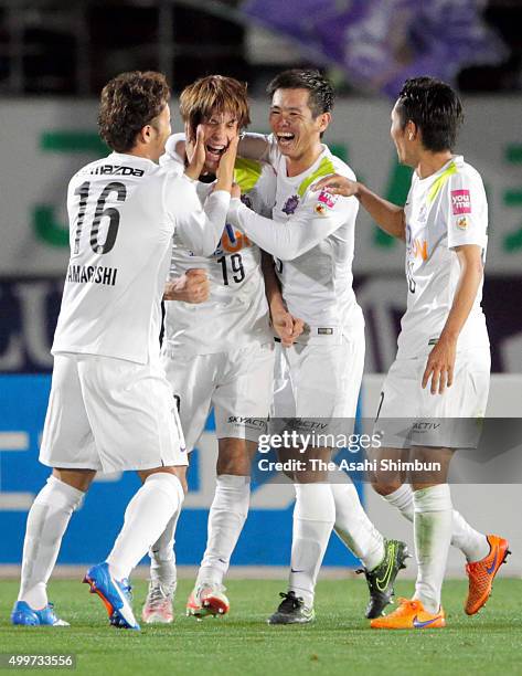 Sho Sasaki of Sanfrecce Hiroshima celebrates scoring his team's second goal with his team mates during the J.League Championship Final frist leg...