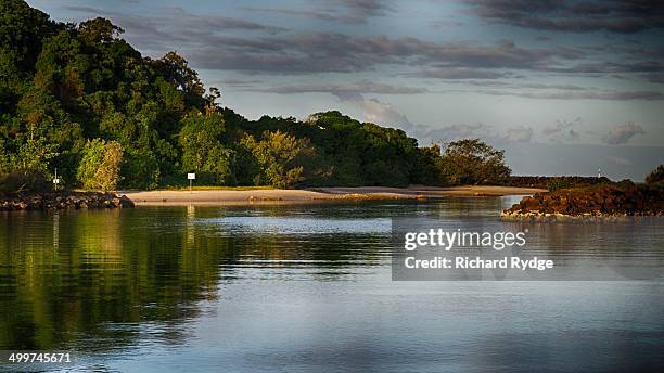 a calm bay in the afternoon light - brunswick heads nsw stock pictures, royalty-free photos & images