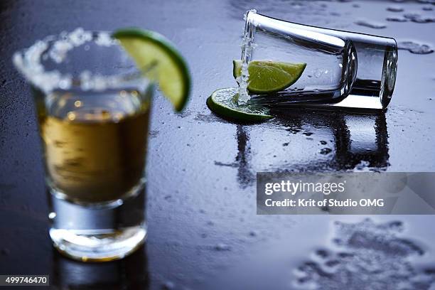 tequila shot - tequila stock-fotos und bilder