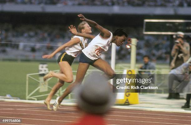 Summer Olympics: USA Wyomia Tyus in action winning Women's 100M qualifying race vs Poland Irena Szewinska at Estadio Olimpico. Mexico City, Mexico...