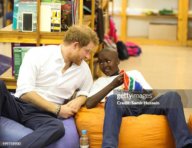 Prince Harry meets Prince Mtimkulul as he visits Siyabonga Secondary School and meets children participating in the Nelson Mandela Champion within...