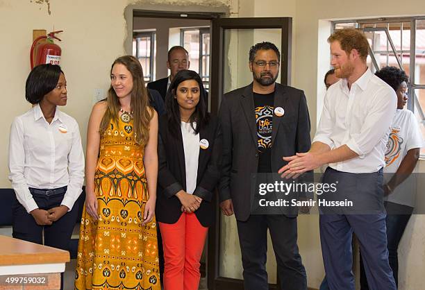 Prince Harry visits Siyabonga Secondary School and meets children participating in the Nelson Mandela Champion within program in Soweto during an...