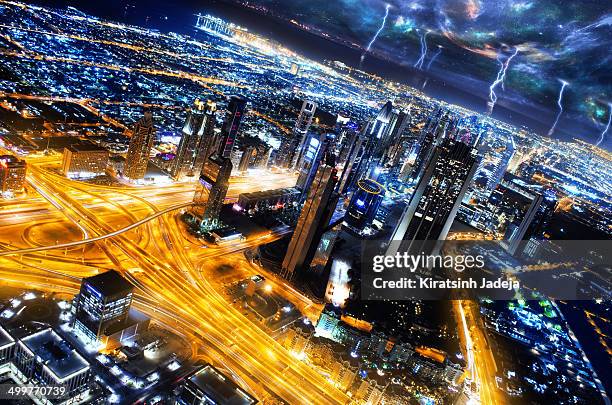 dramatic aerial view of dubai with sci-fi tones - kiratsinh jadeja stock-fotos und bilder