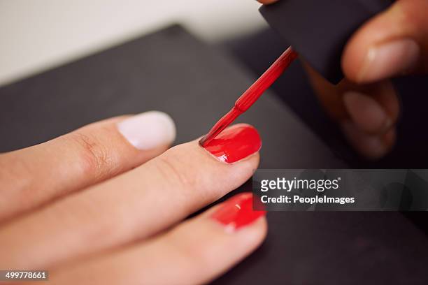 the perfect colour for a night out - painting fingernails stock pictures, royalty-free photos & images