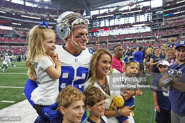 Portrait of Dallas Cowboys Jason Witten with his wife Michelle, sons C.J. And Cooper, and daughters Landry and Hadley Grace on sidelines before game...