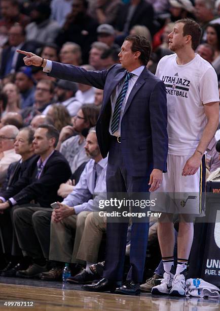 Head coach Quin Snyder, of the Utah Jazz directs his players along with forward Joe Ingles during a game against the Golden State Warriors during a...