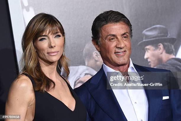 Jennifer Flavin and actor/producer Sylvester Stallone arrive at the premiere of Warner Bros. Pictures' 'Creed' at Regency Village Theatre on November...
