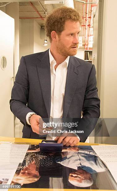 Prince Harry visits the archives at the Nelson Mandela Foundation Centre of Memory on December 3, 2015 in Johannesburg, South Africa. Prince Harry is...