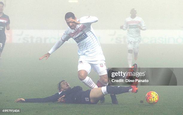 Marco Borriello of Carpi FC is challenged to Andrej Modic of AC Vicenza during the TIM Cup match between Carpi FC and AC Vicenza Calcio at Alberto...